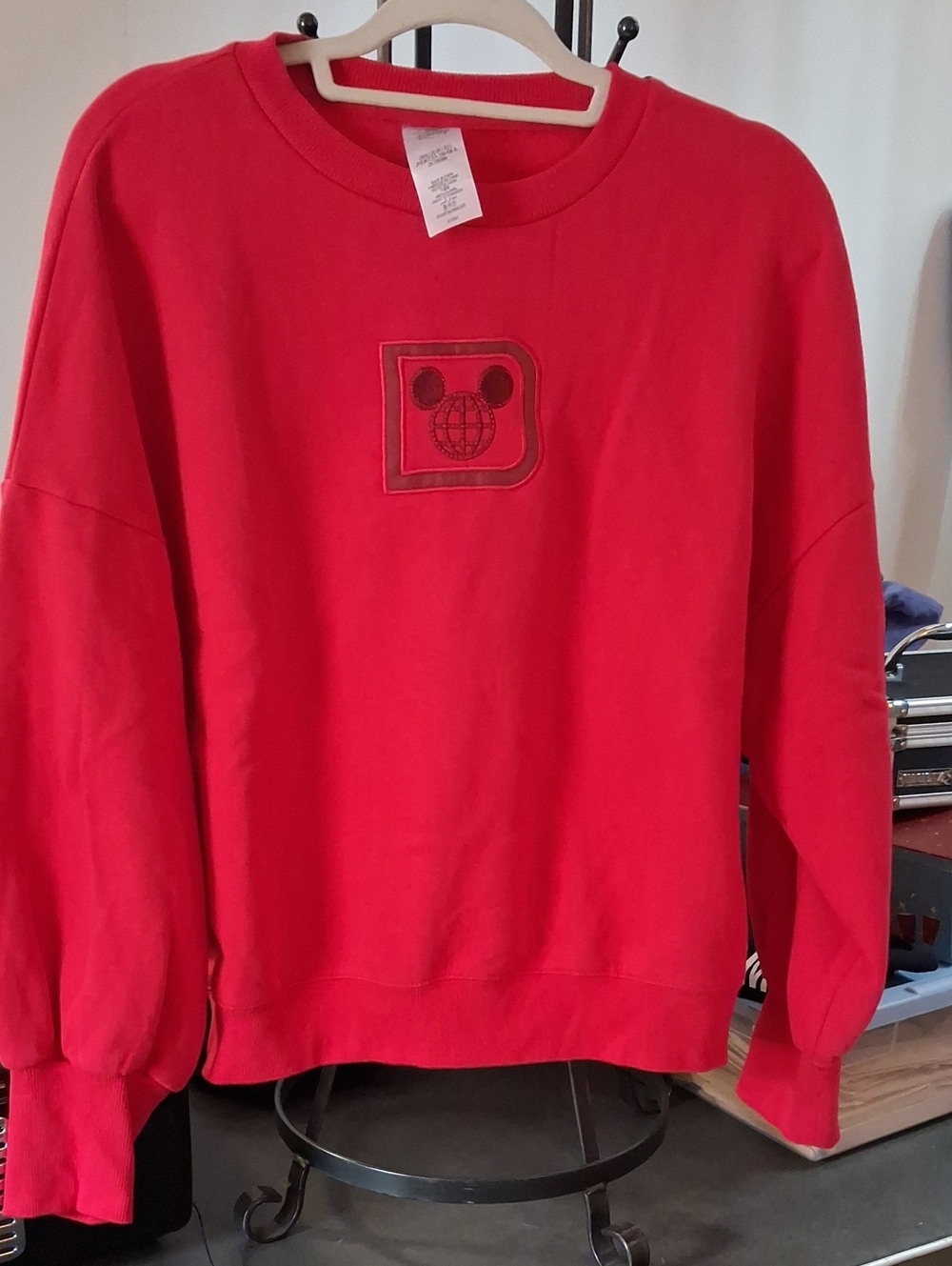 Disney Red Crewneck Sweatshirt with Embroidered Globe Patch